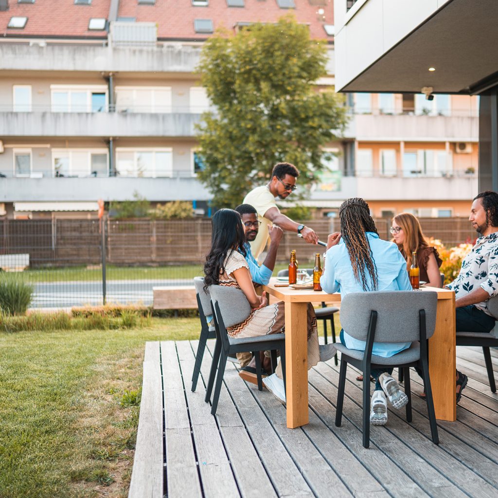 family-eating-outside-on-deck
